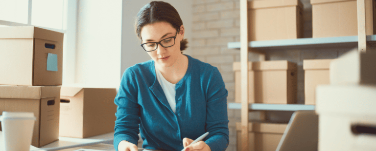 woman reviewing document on if a merchant cash advance is legal