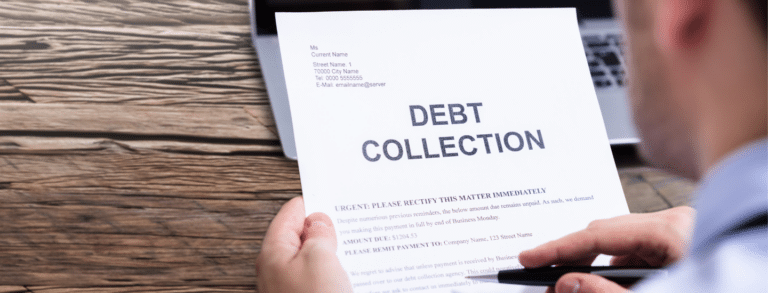 white man holding a piece of paper that say "debt collection"